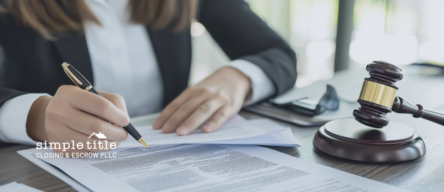 Real estate contract on a desk with house keys and a pen, symbolizing property title and ownership documentation.